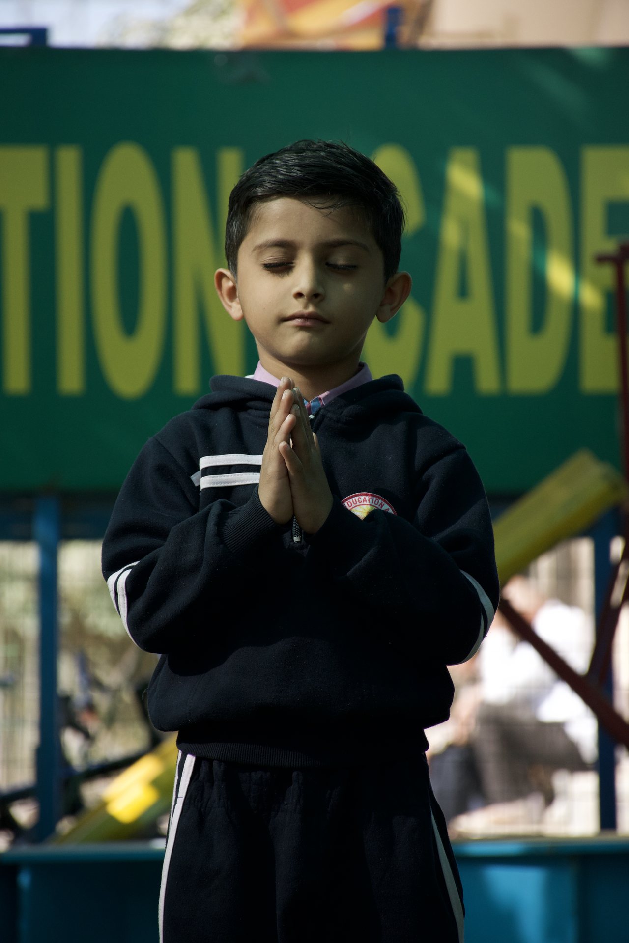 Student reciting the morning prayer