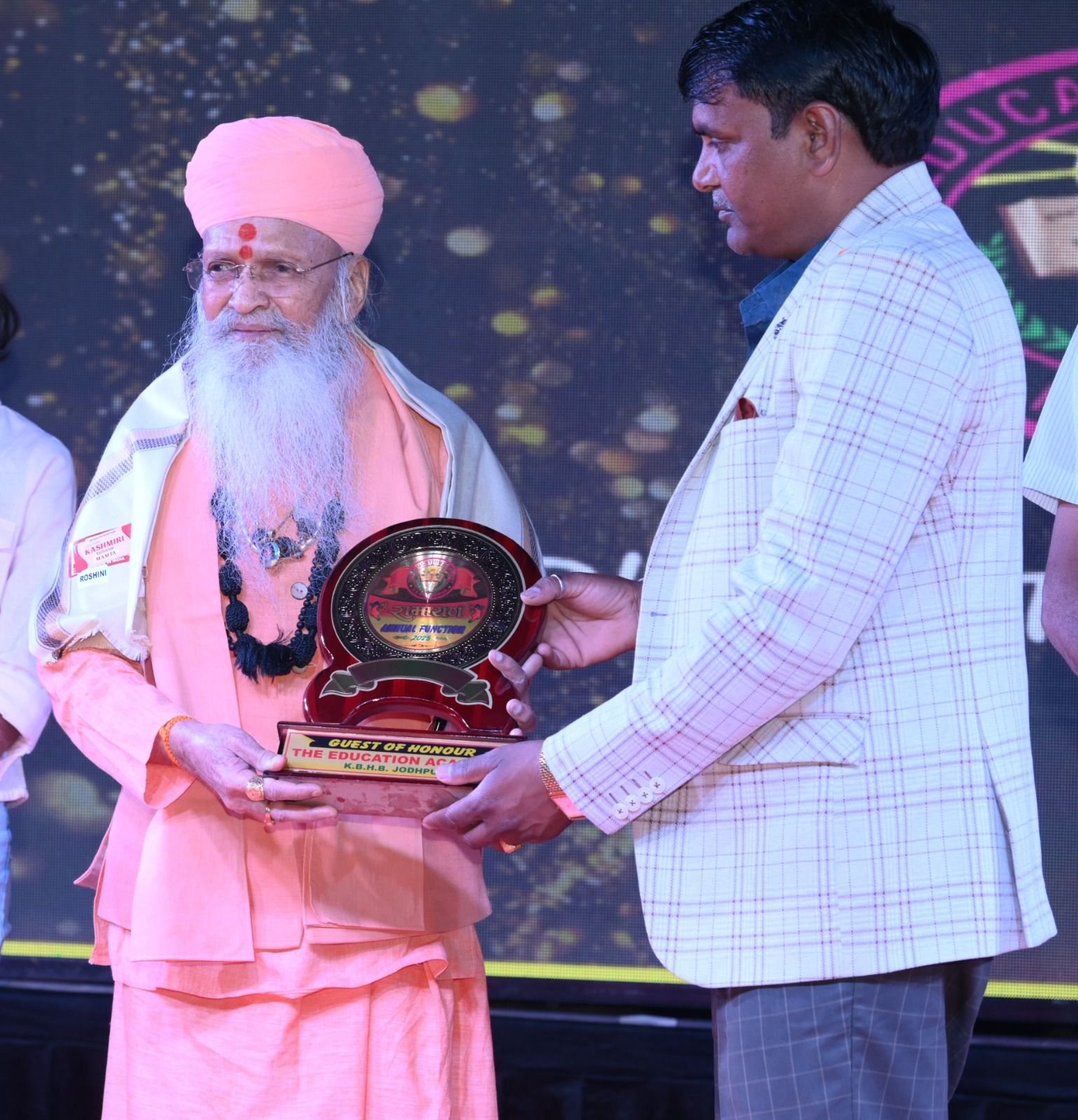 Presenting a memento to the Guest of Honour