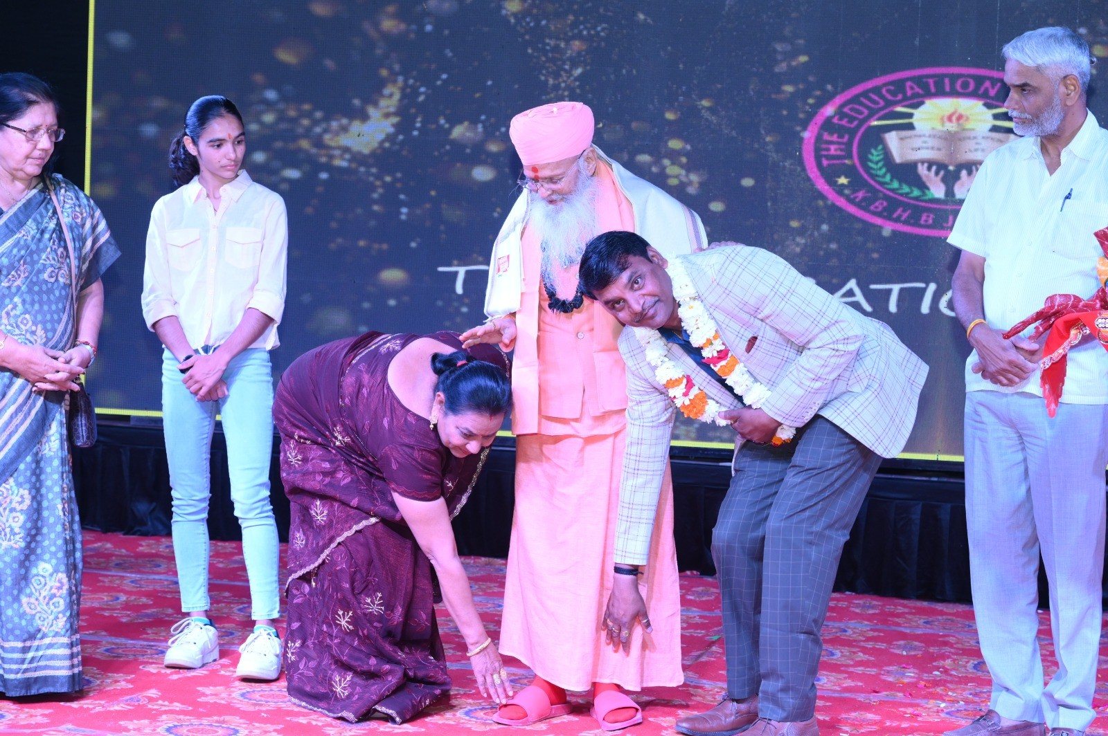 A moment of blessing and respect on stage